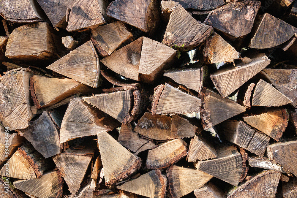 Rustic firewood as background texture Rustic firewood as background texture
