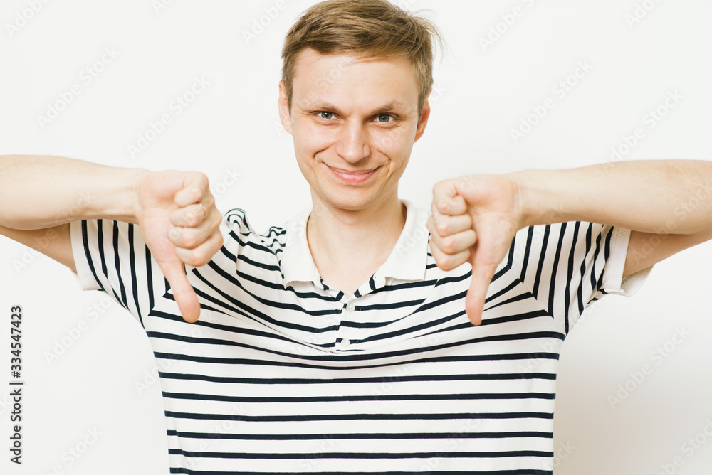 man showing a thumb down gesture