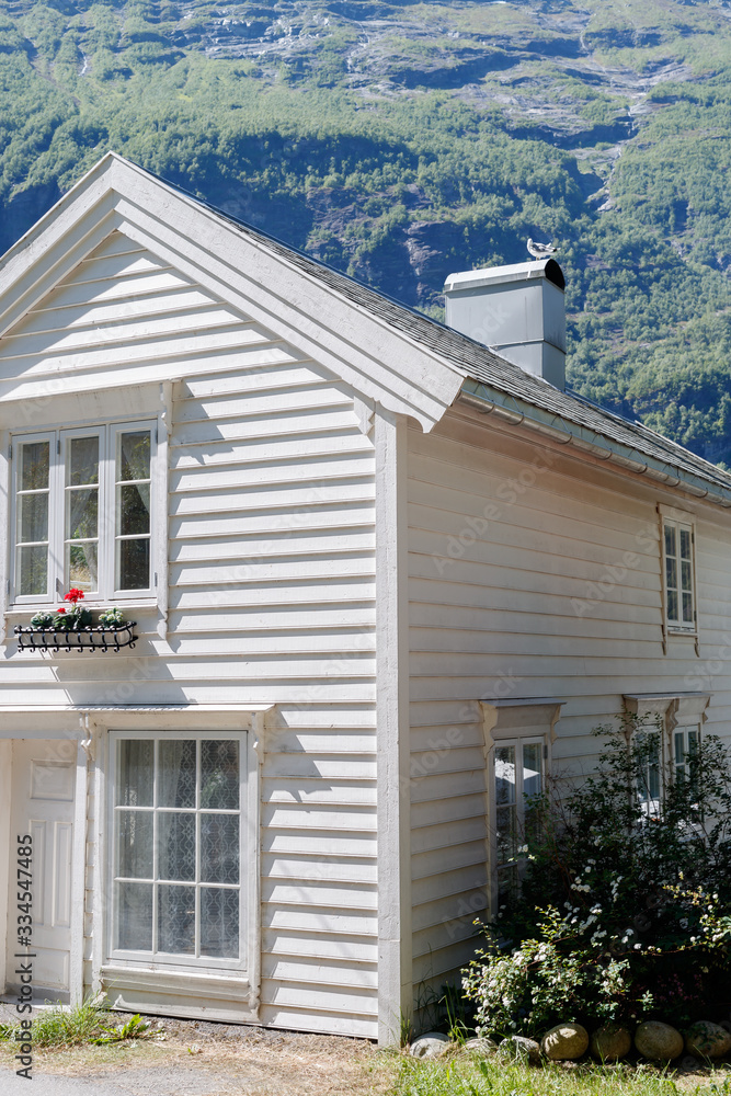 GEIRANGER, NORWAY - 2016 JUNE 14. White beautiful house in Geiranger village.