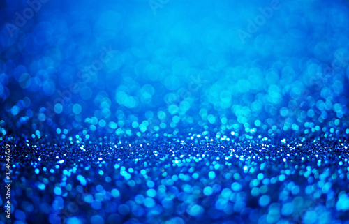 Glitter light abstract blue bokeh light background