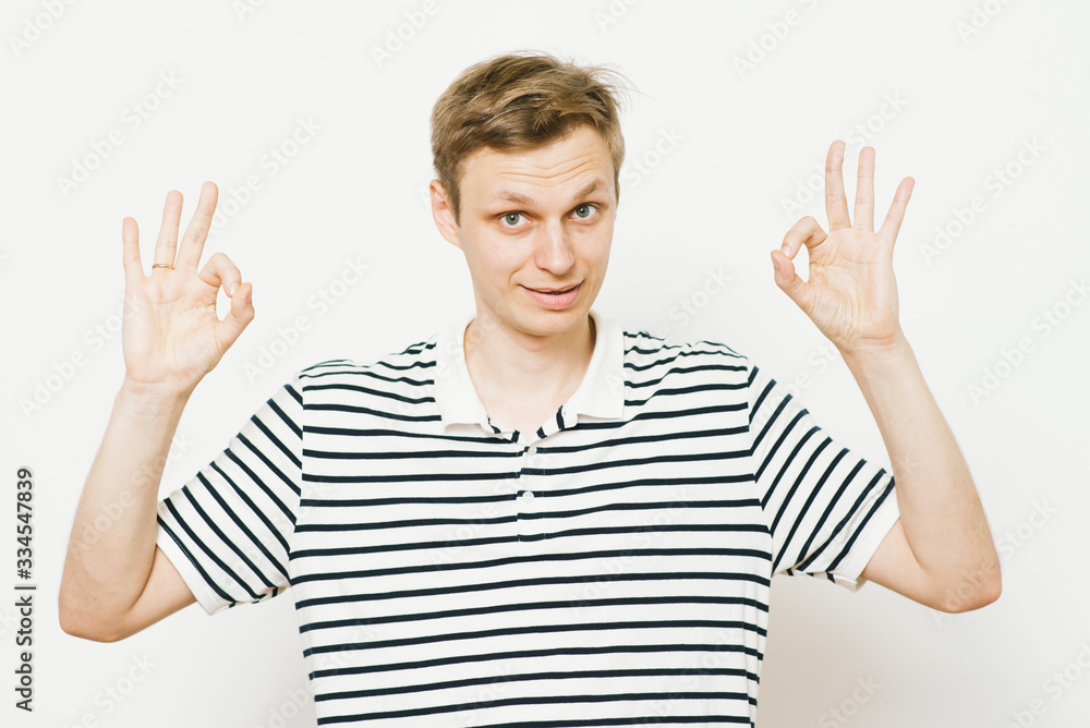 man shows that everything is fine, don't worry. all okay. Gesture. Close portrait. man shows that everything is fine, don't worry. all okay. Gesture. Close portrait.