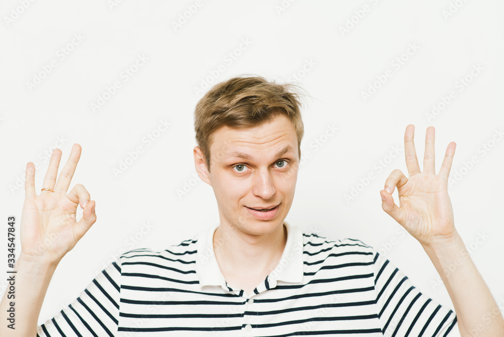 man shows that everything is fine, don't worry. all okay. Gesture. Close portrait. man shows that everything is fine, don't worry. all okay. Gesture. Close portrait.