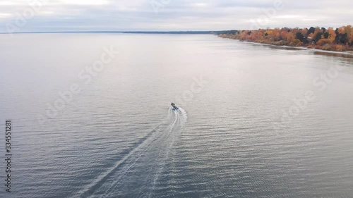 Boat driving alog coastline