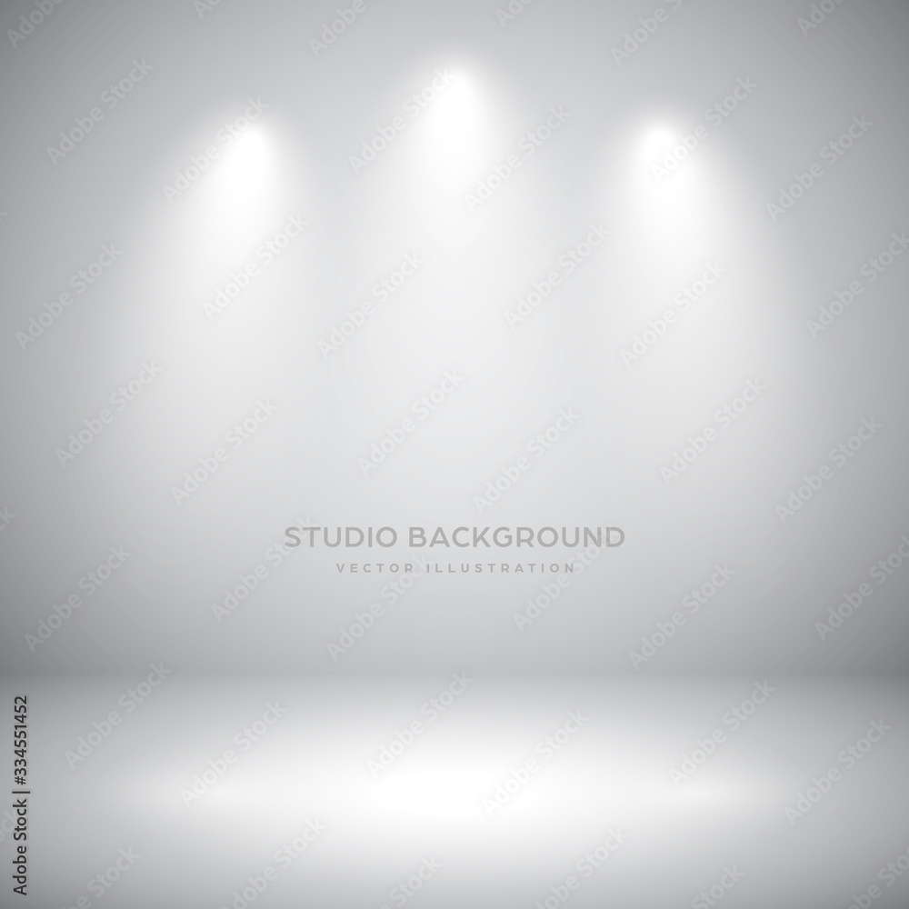 Empty gray studio abstract background with spotlights. Product showcase backdrop. Empty gray studio abstract background with spotlights. Product showcase backdrop.