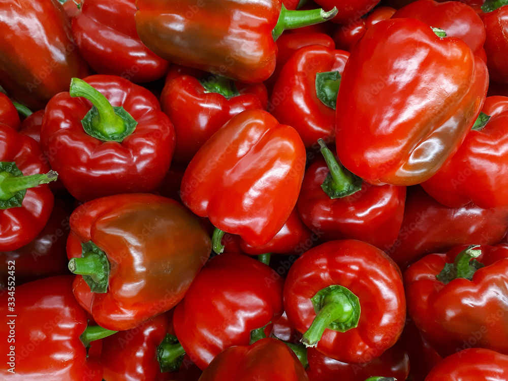 Fresh red bell pepper in market, healthy food. Bright sweet red pepper, top view, natural background Fresh red bell pepper in market, healthy food. Bright sweet red pepper, top view, natural background