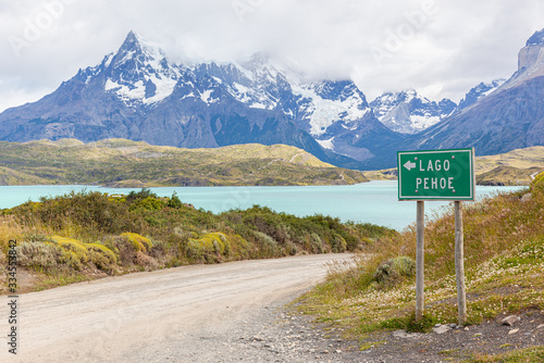 Road and sign of Pehoe Lake - Torres del Paine National Park