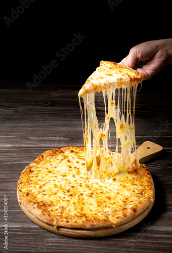 Stretched cheese pizza 