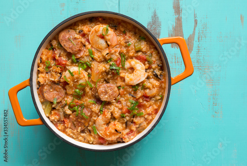 Top view of jambalaya with shrimp and andouille sausage. Copy space. 