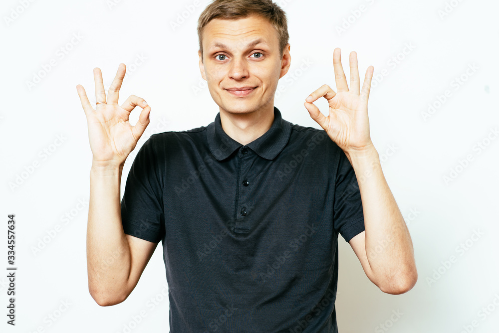 man shows that everything is fine, don't worry. all okay. Gesture. Close portrait. man shows that everything is fine, don't worry. all okay. Gesture. Close portrait.