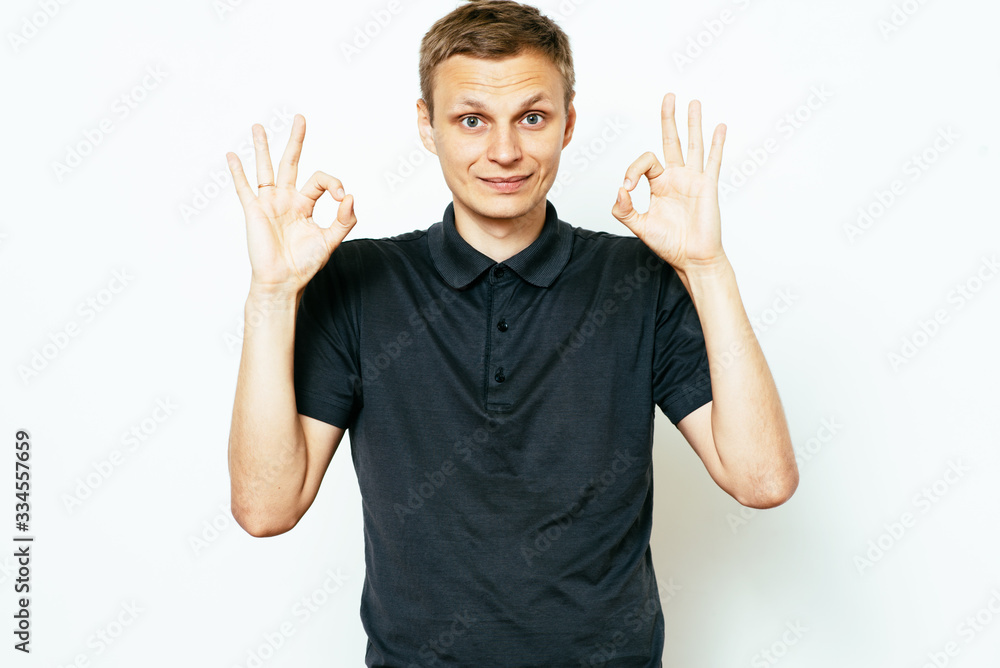 man shows that everything is fine, don't worry. all okay. Gesture. Close portrait. man shows that everything is fine, don't worry. all okay. Gesture. Close portrait.