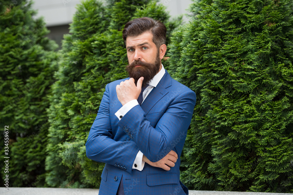 Business man bearded wear perfect fashionable suit. Successful entrepreneur. Business life. Man businessman classic style urban park background. Businessman well groomed hairstyle. Business center Business man bearded wear perfect fashionable suit. Successful entrepreneur. Business life. Man businessman classic style urban park background. Businessman well groomed hairstyle. Business center