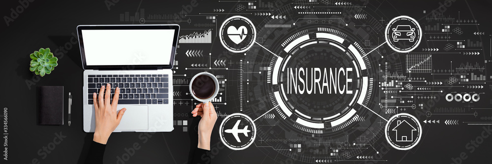 Insurance concept with person using a laptop computer Insurance concept with person using a laptop computer