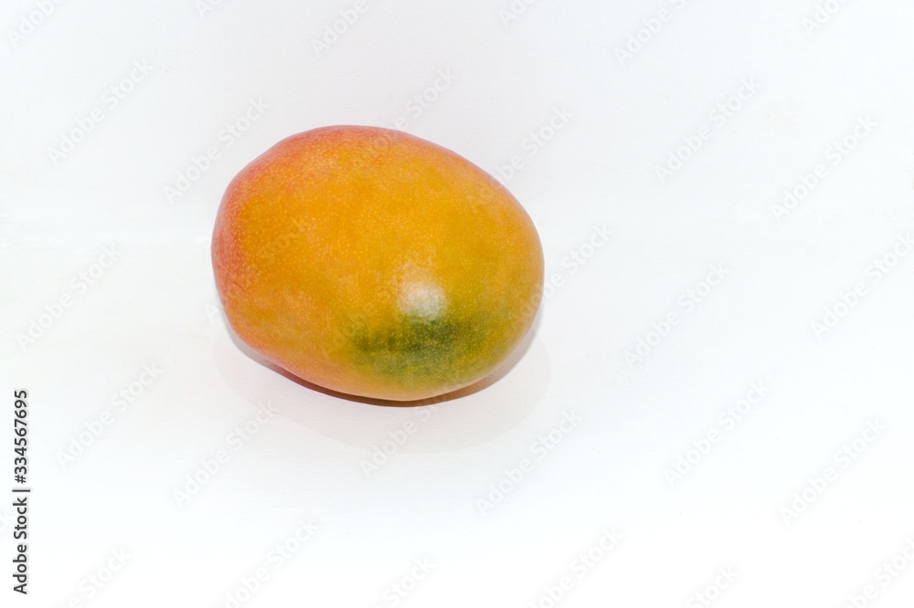 big juicy mango fruit on a white wall background 02 big juicy mango fruit on a white wall background 02