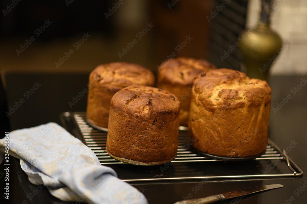 Preparing for Easter. Ready cakes are cooling on the stand. Preparing for Easter. Ready cakes are cooling on the stand.