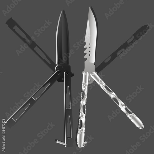 Realistic black and silver balisongs or butterfly knives
