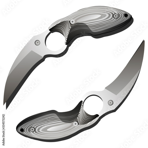 Two isolated realistic karambits with wooden handle