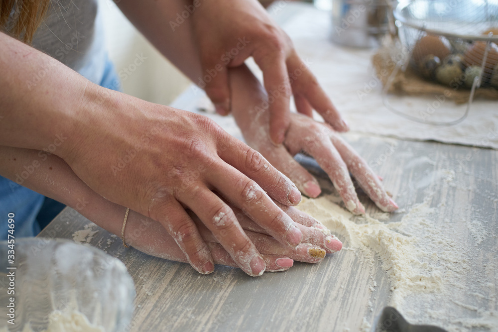 women's and men's hands mix wheat flour. baker's hand closeup.couple together Cooking pizza, bread women's and men's hands mix wheat flour. baker's hand closeup.couple together Cooking pizza, bread