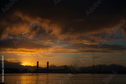 Caribbean island industrial port at dusk