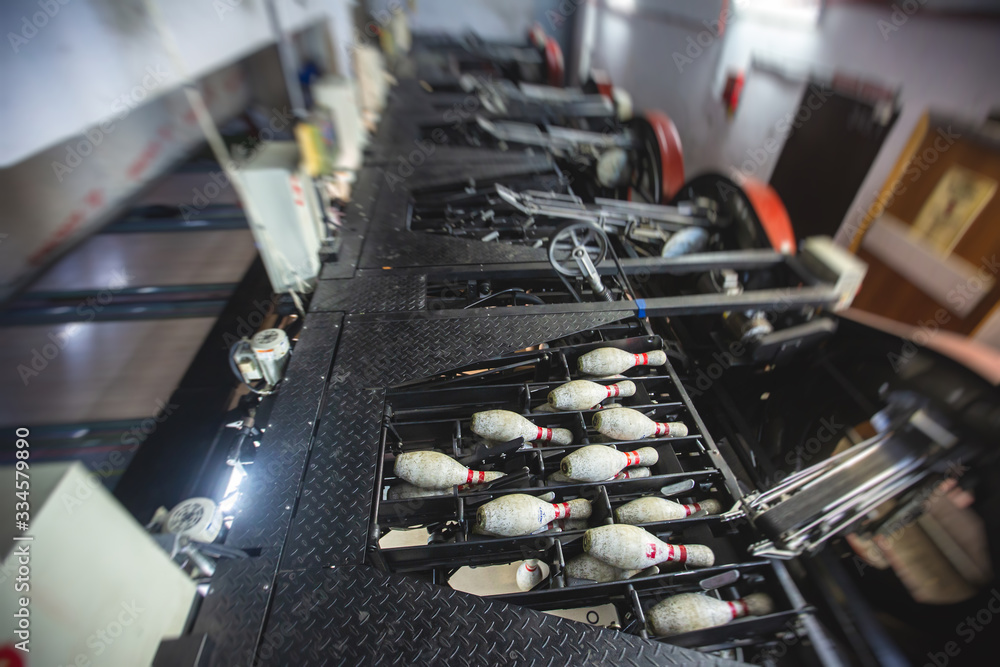 Bowling pinsetter machine, behind the bowling alley, pinspotter