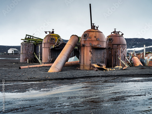 Photography ruins of old equiplment of whale plant in Antarctica