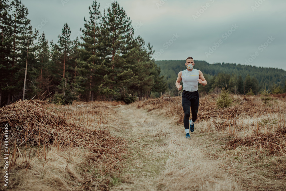 Man training with a mask due to the corona virus