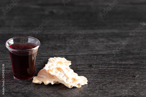 Elements of the Holy Communion or Lords Supper on a Wooden Table photo