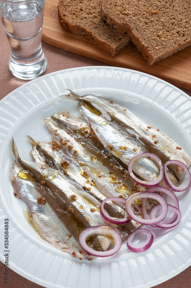 Pickled or Spicy Marinated Smelt Fish with Fresh Onion Pickled or Spicy Marinated Smelt Fish with Fresh Onion