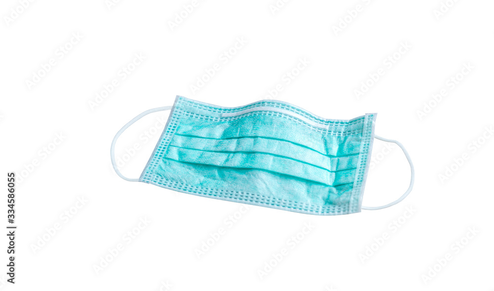 Protective face mask on white background. Typical 3-ply surgical mask to cover the mouth and nose. Procedure mask from bacteria. Protection concept. Surgical mask with rubber ear straps. covid 19 Protective face mask on white background. Typical 3-ply surgical mask to cover the mouth and nose. Procedure mask from bacteria. Protection concept. Surgical mask with rubber ear straps. covid 19