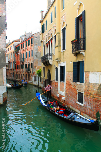 Canal with bridge in Venice  Italy. Architecture and landmark of Venice. Cozy cityscape of Venice.