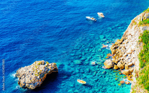 Boats at Capri Island near Naples of Italy reflex