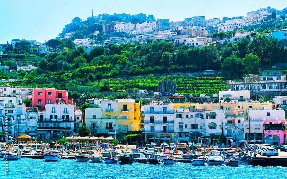 Harbor of Capri Island with boats reflex