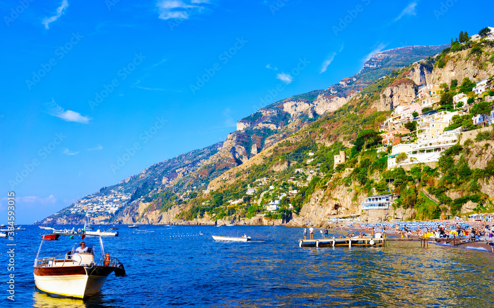 Boat in Tyrrhenian Sea near Beach Positano town Amalfi Coast reflex