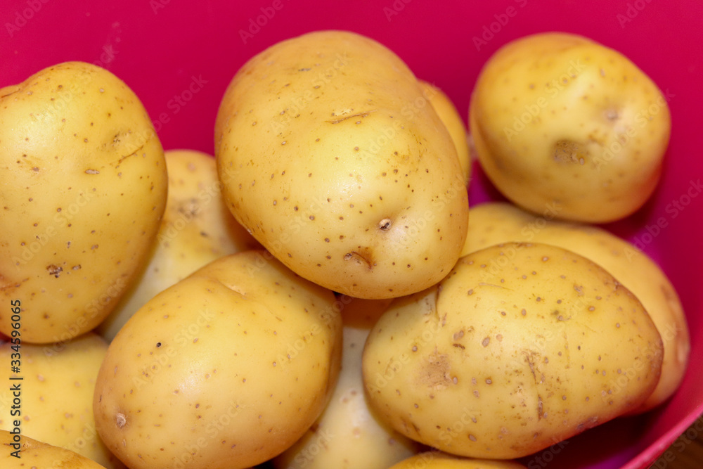 Basket with potatoes. A tuber belonging to the Solanaceae family. Basket with potatoes. A tuber belonging to the Solanaceae family.
