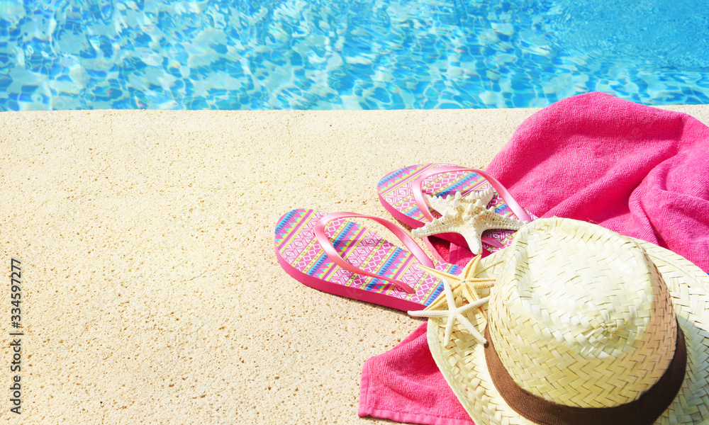 Summer accessories at the swim pool, Travel concept, Vacation time Summer accessories at the swim pool, Travel concept, Vacation time