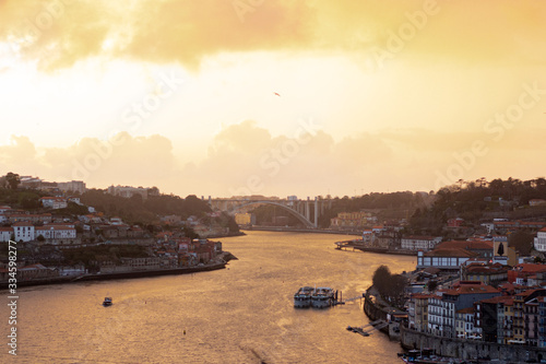 City of Porto in Portugal in a vivid yellow sunset