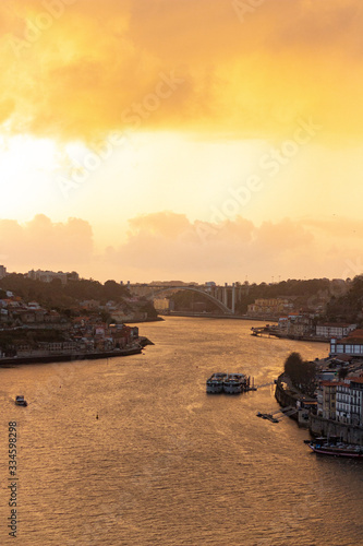 City of Porto in Portugal in a vivid yellow sunset
