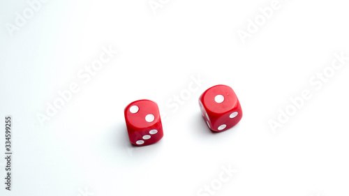 Two dice with one and two count against white background