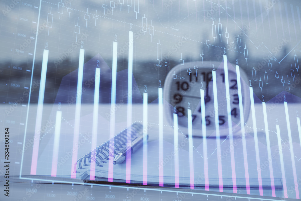 Multi exposure of financial graph drawings and desk with open notebook background. Concept of forex Multi exposure of financial graph drawings and desk with open notebook background. Concept of forex