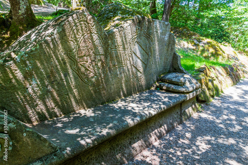 Ancient stone bench in Sacro Bosco, Parco dei Mostri or Park of the Monsters in Bomarzo, Province of Viterbo, Lazio, Italy