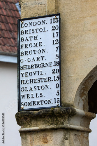 Distance Marker on the Market Cross in Shepton Mallet, Somerset photo