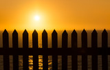 Fence at sunrise