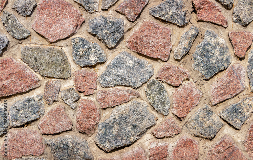 Gray stone wall background. Masonry texture. Gray stone wall background. Masonry texture.