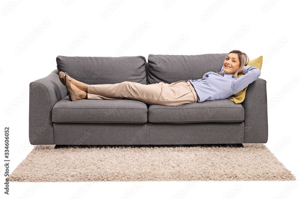Young woman lying on a sofa Young woman lying on a sofa