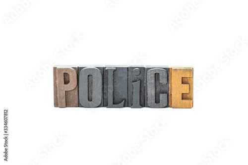 Police in wood block letters