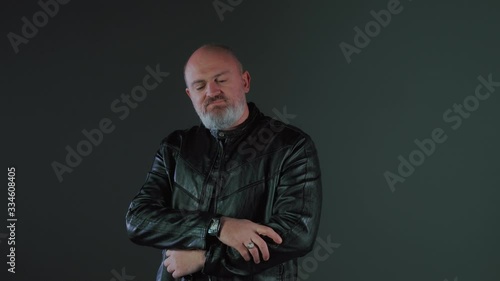 portrait middle aged man posing looking at camera