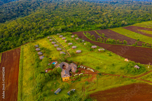 Aerial view of Sasakwa Lodge in Singtia Grumeti Reserves, Tanzania near Kilimanjaro volcano. Beautiful jungle lodge. photo