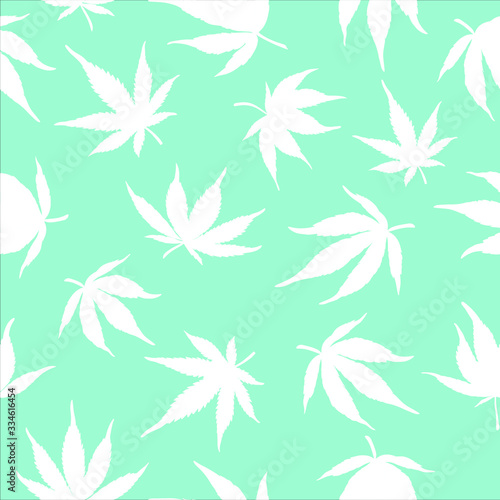 Seamless pattern of cannabis leaves on a blue background. White hemp leaves on a blue background. Vector illustration