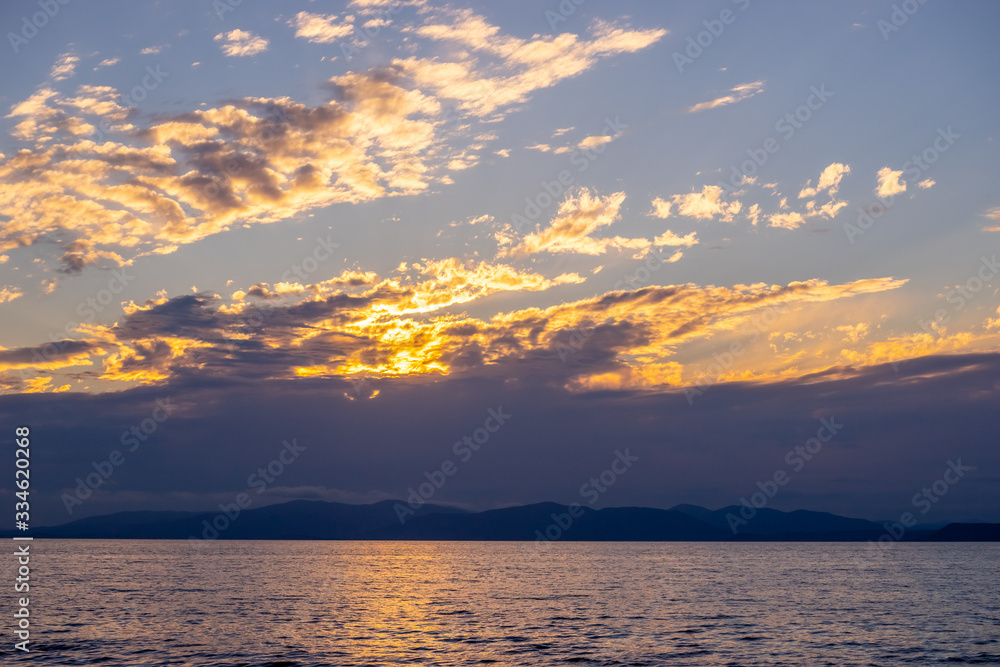Fototapeta premium Dramatic sunset over the sea