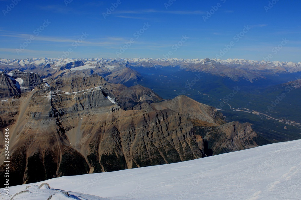View towards Bow Valley and Lake Louise at summit of Mount Temple altitude 11,625 feet above sea level, Canadian Rockies