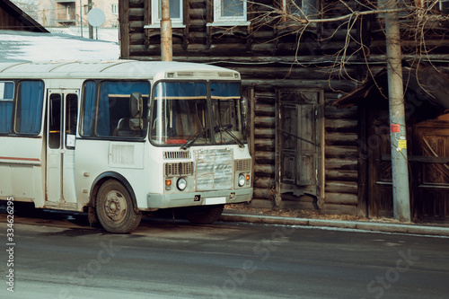  Russian bus "Paz" on the background of an old house